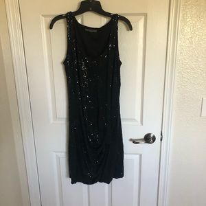Sequin dress with ruching on the hip